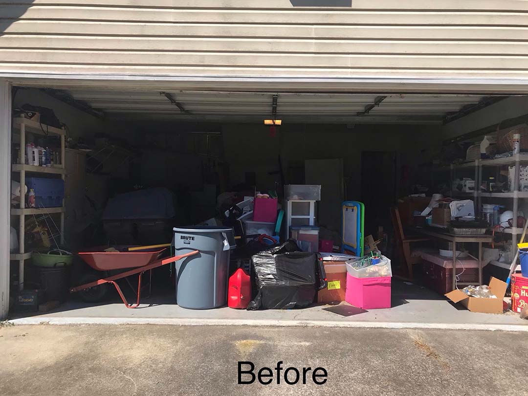 view of garage entry packed before organizing